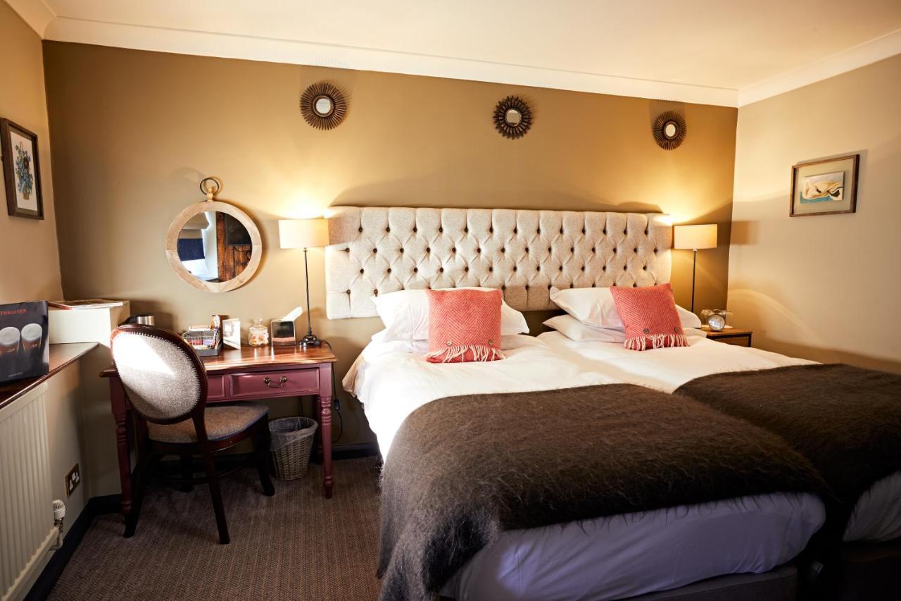 The Fleece At 시런세스터 외부 사진 A room at the hotel
